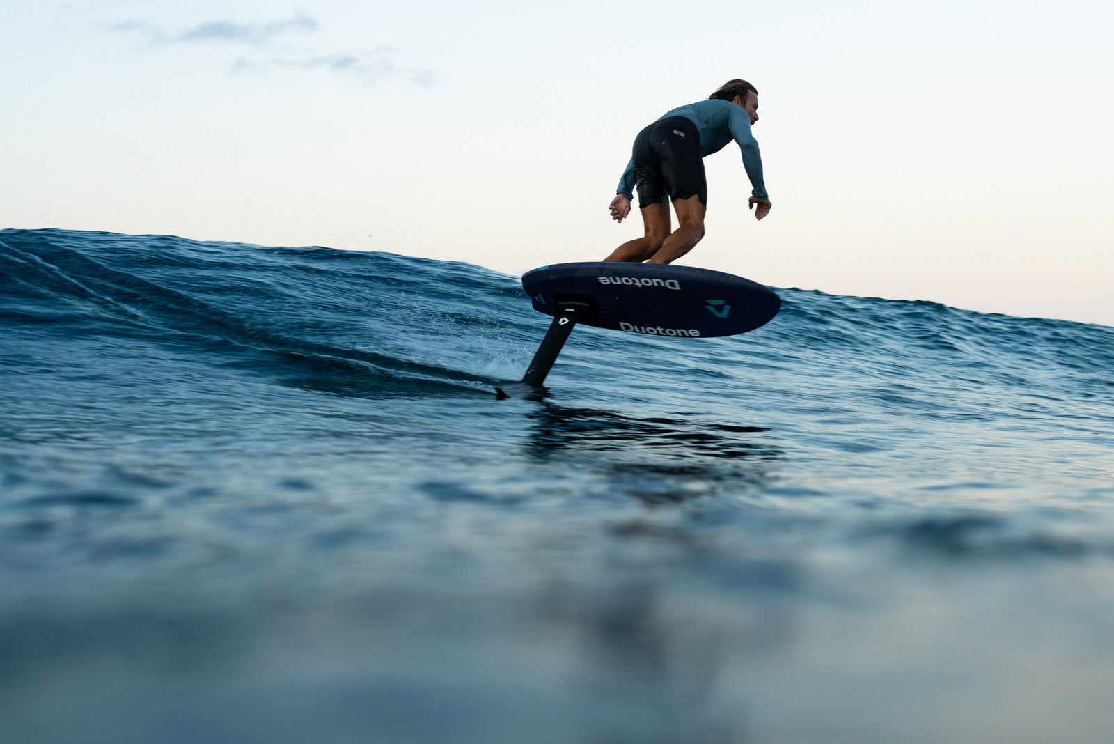 Rider prone foiling a wave on the Duotone Crush SLS 2027
